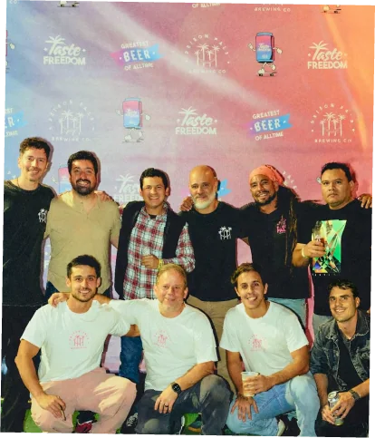 Prison Pals team together in front of the brand backdrop